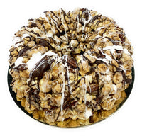 Caramel Pecan Marshmallow Popcorn Cake with Chocolate Drizzle